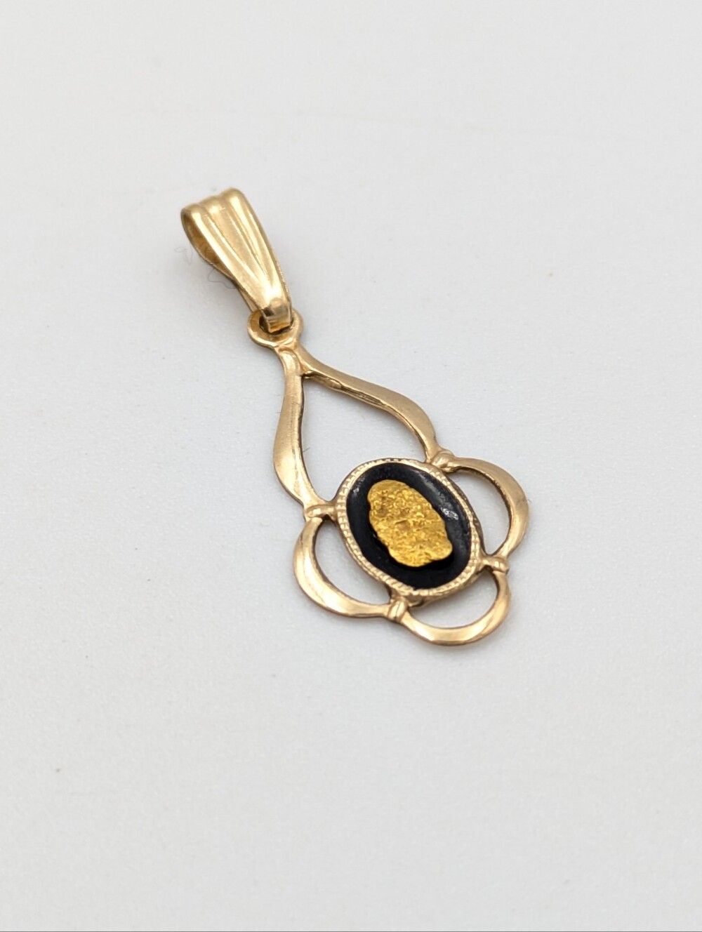Antique 1/20 rose gold filled pendant with yellow gold nugget and black enamel